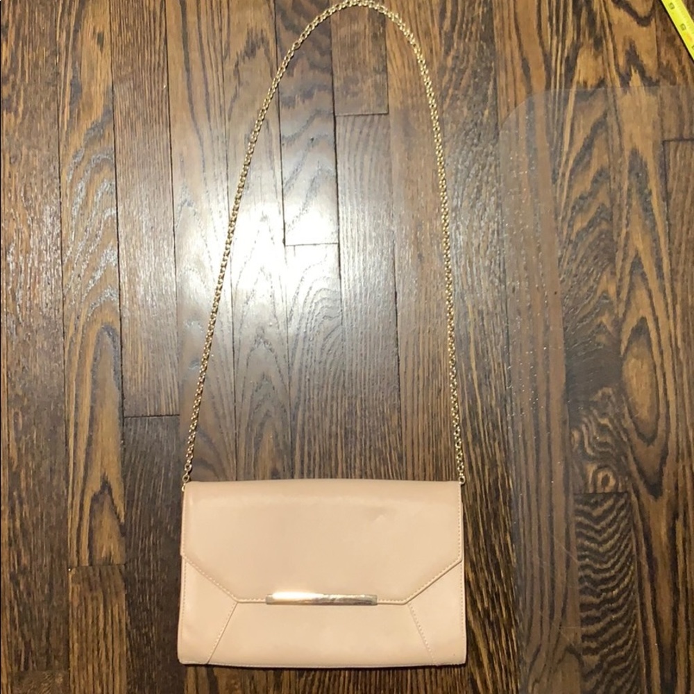 Beige envelope clutch with gold chain